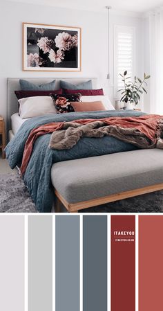 a bedroom with gray and red colors in it