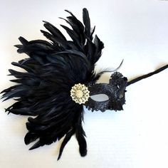 black lace mask with feathers, black feather mask, black masquerade masks women, masks with feather for women Great conversation piece! Hanging Wall art! S H I P P I N G - Last minute masquerade mask shopping? Processed same day or within 24 hours. 1-2 day guaranteed delivery services offered, add items to cart and click on shipping tab for rates. Pls leave a check out note with your need date & contact number (especially for expedited and custom orders) Msg for delivery time frames (Include Black Feathered Masquerade Mask For Costume Party, Black Feathered Masquerade Mask, Black Masquerade Mask Women, Black Lace Mask, Mask With Feathers, Masquerade Mask Women, Elegant Face Mask, Black Masquerade, Masquerade Ball Masks