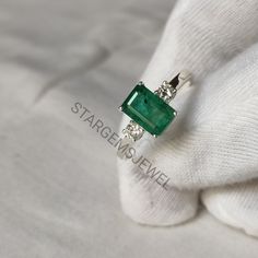 Buyer Must BE Reads All  Details About The Product . Material 925 Sterling Silver . Band Color  Silver . Gemstone Natural Emerald . Gemstone Colour Green . Gemstone Size . Gemstone Shape Cushion . Cut Grade Faceted . Birthstone  May . Style  Art Deco . Ring  womens And Girls Gia Certified Sterling Silver Ring, Silver Three Stone Emerald Ring For Anniversary, High-quality Emerald Wedding Jewelry, Gia Certified Silver Emerald Ring As Gift, Aaa Quality Diamond Ring Jewelry, Emerald Cut Fine Jewelry, Aaa Quality Emerald Cut White Gold Jewelry, Sterling Silver Three-stone Emerald Ring For Anniversary, Anniversary Sterling Silver Three-stone Emerald Ring