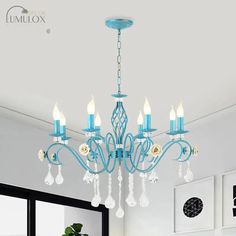 a blue chandelier hanging from the ceiling