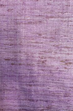 an old purple cloth textured with small dots and lines, as well as the background