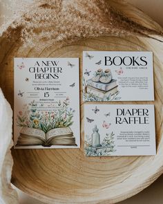 three books sitting on top of a wooden bowl