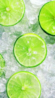 limes are cut in half and placed on ice