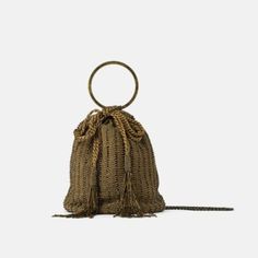 Purchased Directly From Zara. 100% Genuine Zara. #10 Gold Colored Crossbody Bag. Beaded Exterior In A Combination Of Materials. Ring Shaped Handle. Antique Gold Chain Shoulder Strap. Linen Interior. Drawstring Closure With Tassel Detail. Color : Gold 8.3" Height X 4.3 Length X 4.3 Inches Or 21 X 11 X 11cm Composition Outer Shell 100% Viscose Strap 100% Zamak Shoulder Strap 100% Iron Lining 100% Cotton Blogger Fav Sold Out Store And Online Zara Purse, Beaded Crossbody Bag, Crossbody Saddle Bag, Zara Handbags, Linen Interior, Zara Gold, Studded Bag, Zara Bags, Faux Leather Bag