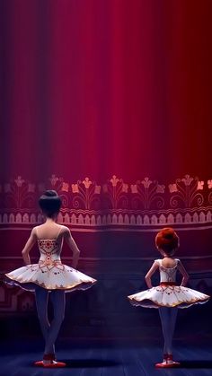 two young ballerinas in white and red tutus