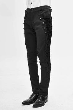 The Louis Pants Ornate and stylish, Vampire style slim-fit trousers with uniquely embellished and velvet laced side panels, plus an ornamental buckle on the back. A subtle, all-over crest pattern adds a dark Victorian vibe.. Material: Cotton/Spandex Blend. Fitted with a slight stretch. Size S M L XL 2XL 3XL 4XL Waist 33.1" (84cm) 35.0" (89cm) 37.0" (94cm) 38.9" (99cm) 40.9" (104cm) 42.9" (109cm) 44.9" (114cm) Length 42.5" (108cm) 42.7" (108.5cm) 42.9" (109cm) 43.1" (109.5cm) 43.3" (110cm) 43.5" Vampire Pants Men, Rocker Pants Men, Men’s Witch Fashion, Victorian Pants Mens, Victorian Men Clothes, Mens Gothic Clothing, Vampire Clothes Men, Vampire Outfit Male, Vampire Fashion Men