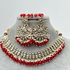 Red Kundan Necklace Set/ Kundan Choker/ Bollywood Jewelry/ Indian jewelry/ Pakistani necklace/ punjabi necklace/bridal/indian wedding Regular Size And Adjustable Kundan Necklace Indo-Western Necklace Set This is 100% Handmade jewelry. So Color, shades, texture displayed may slightly vary from the actual product due to digital image limitations. We request you to consider these minor variations. Please expect the possibility of some slight imperfections when buying hand made jewelry. If you have any questions, please message or email us. Arrives in gift box. Please let me know if you have any questions. Thank you so much visiting my shop. Red Temple Jewelry Necklaces For Wedding, Bollywood Style Red Tikka For Festivals, Bollywood Red Tikka For Festivals, Red Bollywood Festival Tikka, Red Kundan Necklaces With Meenakari, Red Kundan Necklace With Meenakari Detail, Red Kundan Necklace With Stone Work, Red Kundan Necklace With Meenakari For Party, Red Kundan Tikka For Diwali