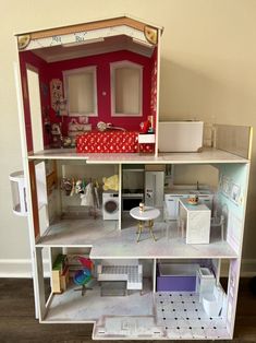 a doll house with all the furniture and accessories