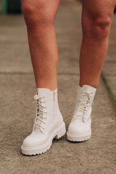 Versatile ivory combat boots. These fit true to size. If you are between sizes, size up. Cream Ankle-high Lace-up Boots For Fall, Cream Lace-up Ankle-high Boots For Fall, Cream High Ankle Lace-up Boots For Winter, Spring Ankle-high Combat Boots With Lug Sole, White Mid-calf Boots With Medium Width And High Ankle, White Mid-calf Boots With Medium Width, Trendy Cream Lace-up Boots, White High-top Combat Boots With Lug Sole, White High-top Mid-calf Boots For Fall