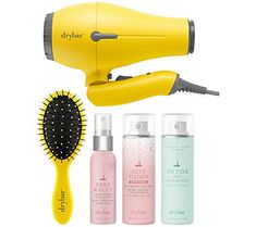 Drybar Baby Buttercup Travel Blow-Dryer is the ultimate travel dryer, tested to deliver the power and performance for the perfect blowout on-the-go. Using ionic technology, a negative ion generator blows negative ions into hair. The wave heater allows for uniform heat distribution for faster and more even drying. A 1200 watt motor and two heat settings provide the perfect balance of heat and airflow.  This bundle also includes Lil' Lemon Drop Travel Detangling Brush, Detox Dry Shampoo, Prep Rall Baddie Attitude, Travel Blow Dryer, The Perfect Blowout, Perfect Blowout, Go Kit, Heat Protectant, Marula Oil, Styling Iron, Detangling Brush