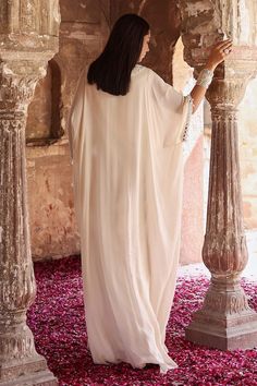 Ivory draped kaftan with resham, thread, mirror, glass bead, pearl embroidery in floral pattern and tassel detailing on sleeves. - Aza Fashions Draped Kaftan, Ivory Drapes, Kaftan Pattern, Chiffon Embroidery, Kaftan Women, Kaftan For Women, Pearl Embroidery, Indian Wedding Wear, Beaded Neckline