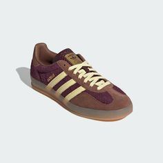 adidas Gazelle Indoor Shoes - Burgundy | Free Shipping with adiClub | adidas US Brown Adidas Low-top Sneakers, Brown Low-top Adidas Sneakers, Brown Adidas Sneakers With Logo, Sporty Brown Sneakers With Three Stripes Branding, Brown Sneakers With Three Stripes And Round Toe, Brown Sneakers With Three Stripes Branding, Sporty Brown Sneakers With Three Stripes, Brown Sporty Sneakers With Three Stripes, Brown Casual Sneakers With Three Stripes