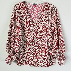 Vince Camuto Desert Summer Elegant Leopard Print Red Blouse Color: Red Cream Description:Pullover Cinched Wrist Ruffle Sleeve Fabric: Poly Approximate Across Measurement: Bust 20" Length 25" Sleeve 24" Great Condition Smoke Free Pet Free Storage Red Long Sleeve Blouse With Blouson Sleeves, Red Blouse With Blouson Long Sleeves, Chic Red Printed Tops, Red Printed V-neck Blouse, Red V-neck Blouse For Fall, Red Printed Tops For Work, Red Printed Tops For Workwear, Elegant Red Top With Blouson Sleeves, Chic Red Printed Blouse