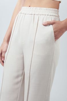 Introducing the Lakeyo Lorelei Pants, your new go-to for comfort and style. Made with 100% polyester, these pants are lightweight, breathable, and perfect for any occasion. The slim fit design flatters your figure, while the elastic waistband ensures a comfortable fit all day long. Whether you're dressing up for a night out or keeping it casual for a day at home, the Lorelei Pants will keep you looking and feeling your best. Upgrade your wardrobe with these versatile and fashionable pants today.- side pockets - front pleats details - side pockets - elastic waist design - tapered hemline Composition: 100% polyester Wool Winter Coat, Vacation Days, Winter Pants, Winter Tops, Winter Essentials, Everyday Wardrobe, British Indian, Wool Coat, Brunei