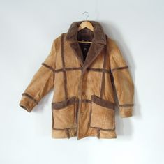 "Brand: Field and Stream Size: 40 (m/l) Nice condition- very well made. Sueded Lamb pile faux shearling/fur lined heavy Patchwork Rancher/Marlboro Man style buttons all the way to neck (sorry I didn't take photo of that feature, looks cool buttoned all the way) Soft supple suede Rancher Style Above knee longer coat warm! 20\" shoulder to shoulder 25\" sleeve length 23\"pit to pit 33\" full length" Vintage Patchwork Winter Outerwear, Vintage Patchwork Outerwear For Winter, Vintage Quilted Outerwear For Fall, Field And Stream, 80s Mens, Cool Buttons, Light Weight Shoes, Man Style, Long Coat