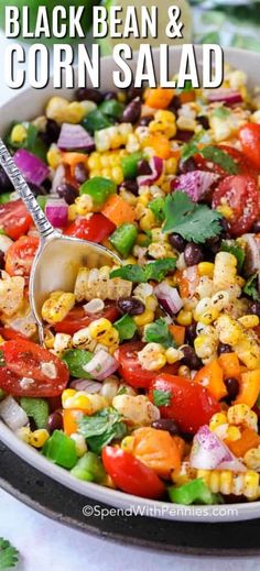 black bean and corn salad in a bowl with a spoon