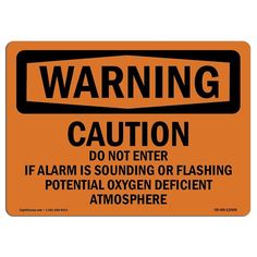 an orange warning sign with the words warning caution do not enter if alarm is sounding or flashing potential oxygen