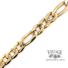 14 karat yellow gold heavy solid figaro link chain bracelet. The estate bracelet is 10.3 mm in width and is 8.5 inches in length and is secured with an integrated box catch with figure 8 safety clasp. Classic Gold Bracelet With Chunky Chain, Classic Figaro Chain Bracelet With Oval Links, Yellow Gold Figaro Chain Bracelet With Rectangular Links, 14k Gold Cuban Link Figaro Chain Bracelet, Classic Gold Bracelet With Oval Link Curb Chain, Formal Figaro Chain Link Bracelet, Classic Yellow Gold Cuban Link Bracelet With Chunky Chain, 14k Gold Cuban Link Bracelet With Figaro Chain, 14k Gold Cuban Link Bracelet With Oval Links