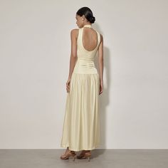 Step into elegance with our Satin Backless Slim Fit Maxi Dress. This stunning piece combines sexy and sophisticated elements, making it perfect for a variety of occasions. Crafted from high-quality polyester, this dress features a sleek and smooth satin finish that drapes beautifully over your silhouette.Key Features: Style: Sexy and elegant, ideal for formal gatherings or casual outings Fit: Regular fit that flatters various body types Fabric: Premium polyester with a luxurious satin feel Pattern: Solid color for timeless versatility Elements: Backless design and patchwork details add a modern twist Neckline: Mock neck for a refined, contemporary look Sleeve Type: Sleeveless design for a fresh, airy feel Product Type: A-line maxi dress that flows gracefully with movement Occasion: Suitabl Curvy Boho, Formal Wear Dresses, Round Neck Dress, Fitted Maxi Dress, Dress Occasion, Backless Maxi Dresses, Round Neck Dresses, Women Long Sleeve Tops, Daily Dress