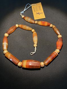 A beautiful faceted cut red carnelian agate beads necklace from Africa Antique carnelian agate beads made in Germany Idar Oberstein in the late 1800's They were used as trade beads in African trade in late 1800's some Gold plated wax beads are used as counter beads we provide fast and free shipping by which can get the items by maximum 7 working days Wax Beads, Carnelian Agate, Red Carnelian, African Trade Beads, Green Jasper, Brass Statues, Jasper Necklace, Carnelian Beads, Banded Agate