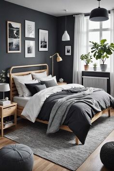 a bed room with a neatly made bed and pictures on the wall