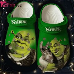 there is a pair of slippers with the characters shrek and donkey on them