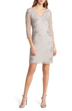 A figure-skimming mesh sheath makes an opulent choice for red-letter events with artfully swirled floral beading with light-catching shimmer. 37" length (size 8) Hidden back-zip closure V-neck Three-quarter sleeves Lined, except sleeves 100% rayon Spot clean Imported Mesh Cocktail Dress, Cocktail Dress Nordstrom, Pisarro Nights, Beaded Flapper Dress, Beaded Party Dress, Evening Mini Dresses, V Neck Cocktail Dress, Black Embroidered Dress, Size 16 Women