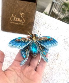 Blue Fairytale - this is the name of a handmade brooch-moth, embroidered with beads.  Perhaps this is your fabulous butterfly?      Cicada is a positive and life-affirming symbol. Handmade fabulous cicada brooch is suitable for any style. Suitable for Victorian style, art deco, boho, modern business look or social events. This brooch will add its own unique accent and attract the attention of the interlocutor and compliments.    The brooch will decorate your look or can be an original gift for a Insect Jewelry Diy, Morpho Menelaus, Moth Brooch, Turquoise Butterfly, Fairy Tattoo Designs, Bead Crafts Diy, Tambour Embroidery, Blue Morpho, Unique Brooch