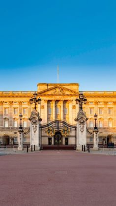 a large building with a gate in front of it