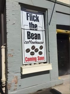 a sign that reads flick the bean coffeehouse coming soon in front of a building