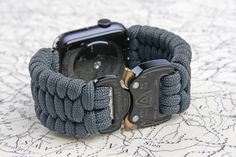 "➖ Made In USA ➖ Handcraft - 100% Nylon Paracord 550 ➖ Designed for Apple Watch 42/44/45mm - Series 7/SE/6/5/4/3/2/1 ➖ Elite-Quality Buckle: Stainless Steel and Aluminum (No PEE) ➖ Quick and Easy Clip/Release ➖ Breathable and Waterproof Our band is made from premium quality 550 paracord and are designed to replace a stock Apple Watch band. This is a unisex watch accessory . Our designs are meant to be stylish and practical. Simple installation on the Apple Watch. Easy clip and quick release. SIZ Watch Accessory, Paracord Accessories, Apple Watch Wristbands, Paracord Diy, Bracelet Apple Watch, 550 Paracord, Unisex Watches, Paracord Bracelets, Apple Watch Strap