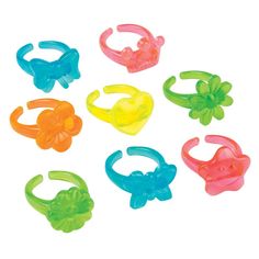 six different colored plastic rings with bows on each one and an attached ring at the top