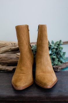 Yep! The Caty Fawn Boot is FINALLY back! Caty Western-inspired ankle boot is a legacy style that has transcended over the seasons. With quality craftsmanship and lux materials, these boots only get better with each wear. Details: Suede upper. Manmade outsole. 7 in / 17.78 cm shaft height. 10 in / 25.4 cm topline circumference. 2.5 in/6.35 cm heel. Textile lining. Padded insole. Zipper closure. Leather stacked heel. Imported. Fits true to size. The Seasons, Get Better, Suede Boots, Stacked Heel, Chelsea Boots, Ankle Boot, Zipper, Boots, Heels