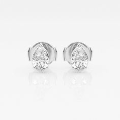 There's nothing more versatile than a pair of classic stud earrings. We love these princess cut lab grown diamond studs for every occasion, be it zoom meetings, brunch with friends or quiet evening dinner with your beau. Pick the size and color best suited to your ears in the color of gold that you fancy. Quiet Evening, Evening Dinner, Solitaire Studs, Pear Cut, Diamond Solitaire, Princess Cut, Diamond Studs, Lab Grown, Lab Grown Diamonds