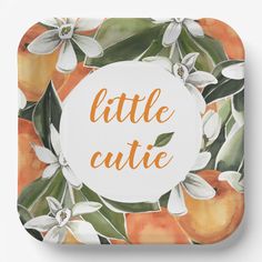 an orange and white square coaster with the words little cutie on it's center