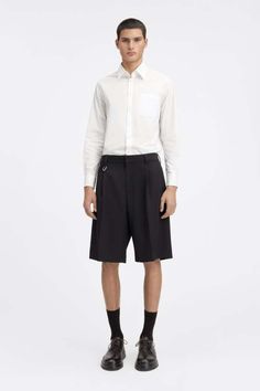 Wide tailored bermuda shorts. Huaraches Shoes, Big Design, Margaret Howell, Norse Projects, Designer Clothes For Men, Engineered Garments, Black Cardigan, Bermuda Shorts, Leg Jeans