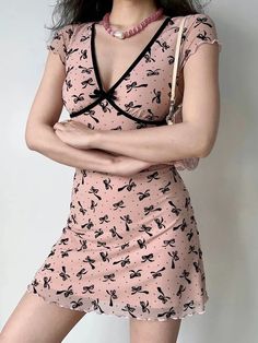 𝔇𝔢𝔱𝔞𝔦𝔩𝔰: Style: Coquette, Ballet Core, Soft Girl Materials: Polyester & Spandex Quantity: Dress This girly and elegant dress features beautiful floral and ribbon prints, perfect for summer days or special occasions. The A-line silhouette is designed to flatter your curves, while the mysterious color adds an element of intrigue. Solid durable material, perfect for spring & summer Enjoy free shipping with a purchase of over 80$ SIZE CHEST LENGTHS 33 in 31 in M 34 in 31 in L 35 in 32 in XL 36 in 33 inItem measured by hands may have 1-2 in differences.SIZE CHEST LENGTHS 80 cm 81 cm M 84 cm 82 cm L 88 cm 83 cm XL 92 cm 84 cmItem measured by hands may have 2-3 cm differences. Coquette Short Sleeve Spring Dresses, Coquette Short Sleeve Dresses For Spring, Short Sleeve Coquette Dresses For Spring, V-neck Spring Dresses With Bow Detail, Fitted Mini Dress With Bow Straps For Summer, Feminine Bow Print Spring Dresses, Feminine Spring Dresses With Bow Print, Spring Bow Print Mini Dresses, Cute Summer Dresses With Butterfly Print