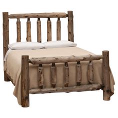 a wooden bed frame with white pillows and blankets on it, against a white background