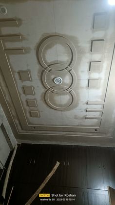 the ceiling has been painted white with numbers on it