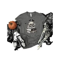 Halloween Tshirt, Halloween Shirt, Skull Tshirt, Witches Spell Shirt, Skeleton, Skeleton Shirt, Cute Skeleton Shirt, Skeleton Head, Spell Shirt, Halloween Skeleton, Halloween Lover Shirt, Halloween Party, Bats Halloween Our skeleton shirt is perfect for the Halloween lovers out there! It features a skeleton, bats, and a stack of spell books to add to your spooky outfit! Adult Unisex Tshirt Soft Cotton, Jersey Material Bella and Canvas 3001 Ribbed knit collars to bolster shaping.  Shoulders have Spooky Skull Print Top For Fall, Spooky Skull Print Fall Top, Spooky Skull Print Tops For Fall, Fall Skull Print Cotton T-shirt, Fall Cotton T-shirt With Skull Print, Casual Skull Print T-shirt For Halloween, Fall Skull Print Short Sleeve T-shirt, Fall Skull Print Short Sleeve Tops, Skull Print Short Sleeve T-shirt For Fall