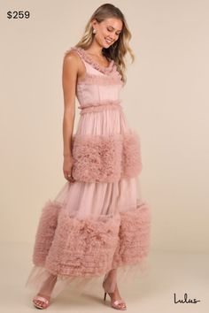 The Sister Jane Montana Pink Tulle Ruffled Sleeveless Maxi Dress is one of those perfect dresses that seems like it stepped out of a dream! Delightfully airy tulle shapes this ultra-femme dress that has a sleeveless bodice with a ruffle-trimmed scoop neckline and a low V-back. Playful, three-dimensional bands of tulle ruffles lend an ethereal sense of volume to the skirt, which finishes at an ankle-length midi hem with a sheer panel. Hidden zipper at back. Fit: This garment fits true to size. Length: Floor length. Bust: Works best for A to C cup sizes - consider sizing up for fuller bust. Waist: Fitted - very fitted at natural waist. Hip: Not Fitted - fuller skirt allows room for hips. Undergarments: May be worn with an adhesive bra, petals, or no bra. Fabric: Fabric has no stretch. Lined. Midi Homecoming Dresses, Pink Sundress, Tulle Maxi Dress, Sisters Dress, Pink Tulle, Dress 100, Sleeveless Maxi Dress, Midi Dress Sleeveless, Homecoming Dresses