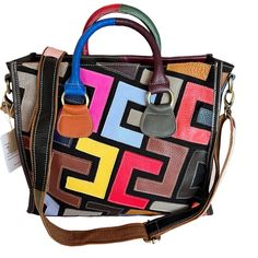 Beautiful And Bright Patchwork Leather Handbag With Adjustable Shoulder Strap Or 5" Handle Removeable Strap. Colors Or Black, Red, Blue, Pink, Yellow, Blues And Brown. Style 1066b Measurements Are In Pictures. Multicolor Crossbody Shoulder Bag For On-the-go, Multicolor Large Capacity Shoulder Bag With Double Handle, Multicolor Large Capacity Double Handle Shoulder Bag, Retro Black Bag For Daily Use, Black Retro Bag For Daily Use, Large Capacity Multicolor Canvas Shoulder Bag, Multicolor Satchel Shoulder Bag With Adjustable Strap, Multicolor Top Handle Shoulder Bag, Retro Black Crossbody Satchel