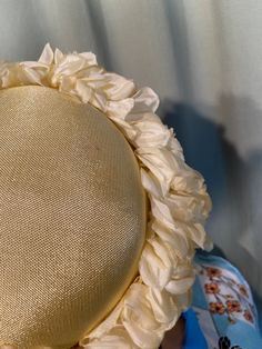 "This is a lovely, vintage hat from the 50s or early 60s. No labels or tags. No size tags. It measures 21\" around the inside. It is made of a stiff, sunny yellow form. The edge has a wide border of yellow fabric flowers, all around. The very edge of the hat is yellow velvet. The hat is in good, vintage condition. No damage or other issues. Small pin dot spot on top. No other soil or wear. So chic!" Vintage Cream Fascinator For Royal Ascot, Cream Vintage Fascinator For Royal Ascot, Vintage Cream Brimmed Sun Hat, Vintage Beige Sun Hat For Kentucky Derby, Vintage Cream Wide Brim Fascinator, Vintage Brimmed Sun Hat For Wedding, Vintage Wide Brim Cream Fascinator, Vintage Beige Summer Fascinator, Cream Wide Brim Vintage Fascinator