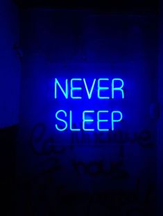 a blue neon sign that says never sleep