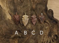 **Turn screen brightness up to 75% to see best color. Photo is unedited to achieve accurate perception** Price is for one pendant. These arrowheads are made of agate and wrapped in plated wire. They are great for creating custom jewelry. I would be able to put one on a necklace for an additional charge. The bail will vary in size but is between 2.5 and 4mm. Total length is approximately 1.5 inches. No two are the same. Please message me with any custom jewelry request or further questions. Wire Wrapped Arrowhead, Arrowhead Necklace, Best Color, Color Photo, Wire Wrapped, Wire Wrapping, Custom Jewelry, Agate, Screen