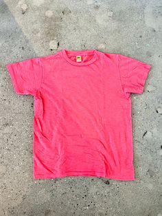 Velva Sheen neon pink raspberry rolled t-shirt. 100% cotton slub tee with a a soft, vintage feel, recreated from the late 70's original. Tube tee with no side seams, made on a circular loom. Runs small but is casual fitting in the body. We recommend sizing up one size. SIZE CHART Measurements Small Medium Large X - Large Chest - armpit to armpit 17 19 21 23 Shoulder to shoulder 15 3/4 16.5 17 1/2 18 1/2 Arm length (shoulder seam to end of hem) 6 3/4 7 1/4 7 1/2 7 3/4 Body length 25 1/4 26 1/2 27 Pre-washed Crew Neck T-shirt For Summer, Pink Washed Cotton Tops, Pink Screen Print Tops, Pink Washed Cotton Top, Streetwear Washed Pink Tops, Pink Washed Graphic Tee, Vintage Pre-washed T-shirt For Summer, Pink Washed Crew Neck T-shirt, Pink Soft-washed T-shirt With Crew Neck