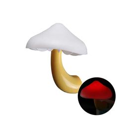 a mushroom lamp with a red light underneath it