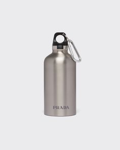 Silver Stainless Steel Insulated Water Bottle, 350 Ml | PRADA Metal Water Bottle, Prada Logo, Lettering Logo, Water Bottle Design, Work Trousers, Airport Fashion, Mens Lifestyle, Insulated Stainless Steel Water Bottle, Rhinestone Designs