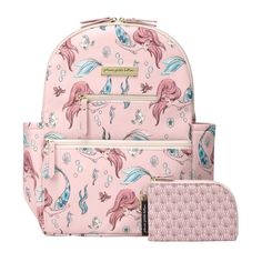 Bubble up with the whimsical world of Ariel, Flounder and friends in a limited edition playful print on an easy-to-clean, blush pink faux leather textile. The Ace Diaper Bag Backpack offers a modern spin on the classic backpack. Compact in stature, but smartly spacious, this bag is designed to keep parents organized with thoughtful details throughout, including an extra-wide opening, two front and one back zippered pockets that are perfect for sunglasses and cell phones, deep exterior pockets to Diper Bags, Leather Diaper Bag Backpack, Baby Wipe Case, Petunia Pickle Bottom, Mermaid Print, Disney Bag, Diaper Bag Backpack, Faux Leather Fabric, Diaper Bags