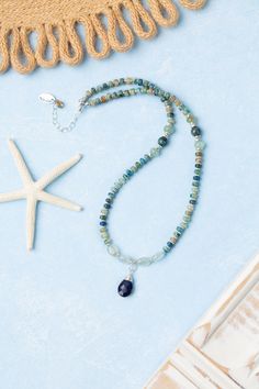 Indulge in the beauty of the sea with our Pacifica Collection! Each piece is meticulously handcrafted with stunning shades of blue, capturing the essence of ocean waves and clear skies. Sterling Silver (Lead & Nickel Free) Aquamarine, Jasper, Apatite, Lapis Lazuli 14.5-16.5" adjustable with sterling silver lobster claw clasp We hand select our natural materials, thus there may be slight variations in color and/or size that will not detract from the overall aesthetic. Our unique handcrafted designer jewelry for women is made in America, each design created individually in our personal design studio in Floyd, VA USA Adjustable Blue Ocean-inspired Necklace, Blue Gemstone Jewelry For The Beach, Artisan Blue Jewelry For Beach, Artisan Blue Jewelry For The Beach, Ocean-inspired Turquoise Necklace With Natural Stones, Turquoise Ocean-inspired Necklace With Natural Stones, Blue Kyanite Gemstone Bead Necklaces, Blue Kyanite Gemstone Beaded Necklace, Blue Gemstone Beads Jewelry For Beach